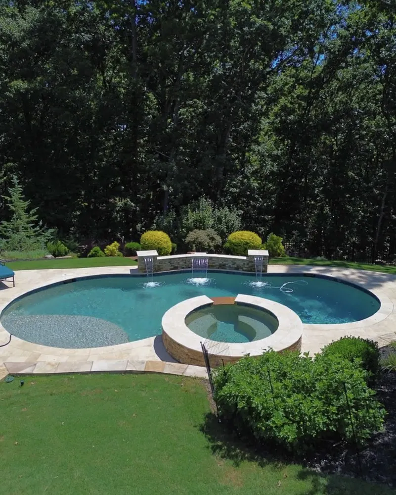 Professional yard cleanup service in Cumming, GA by Reflections Pool & Design