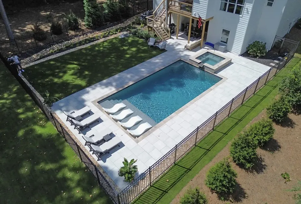 Expert yard cleanup service in Cumming, GA by Reflections Pool & Design