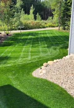 Custom lawn care service for year-round maintenance in Holland, MI by Reform Landscaping