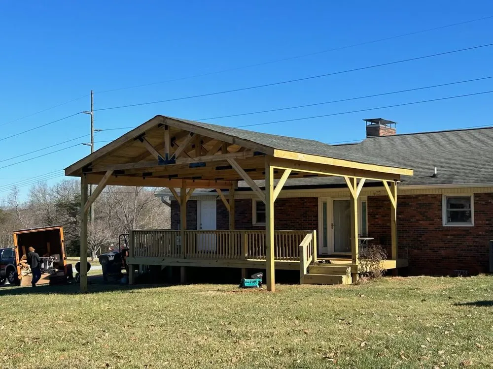 Professional lawn mowing service for residential properties in Morganton, NC by Regino’s Tree Services