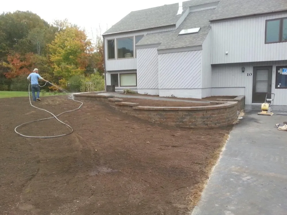 Expert lawn mowing service for beautiful yards across Hudson, NH - Regis Earth Products and Landscaping