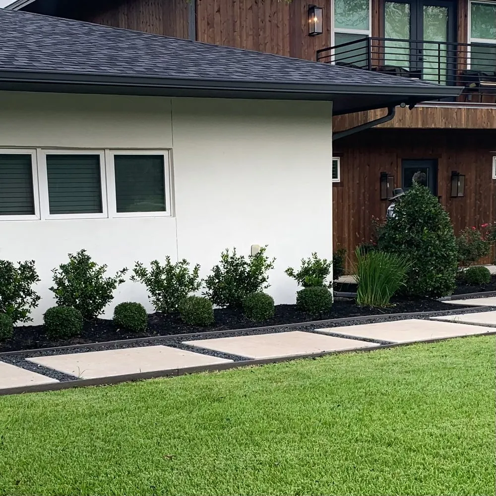 Expert garden landscaping with custom design in Bryan, TX by Regrowth Lawn Care & Landscaping