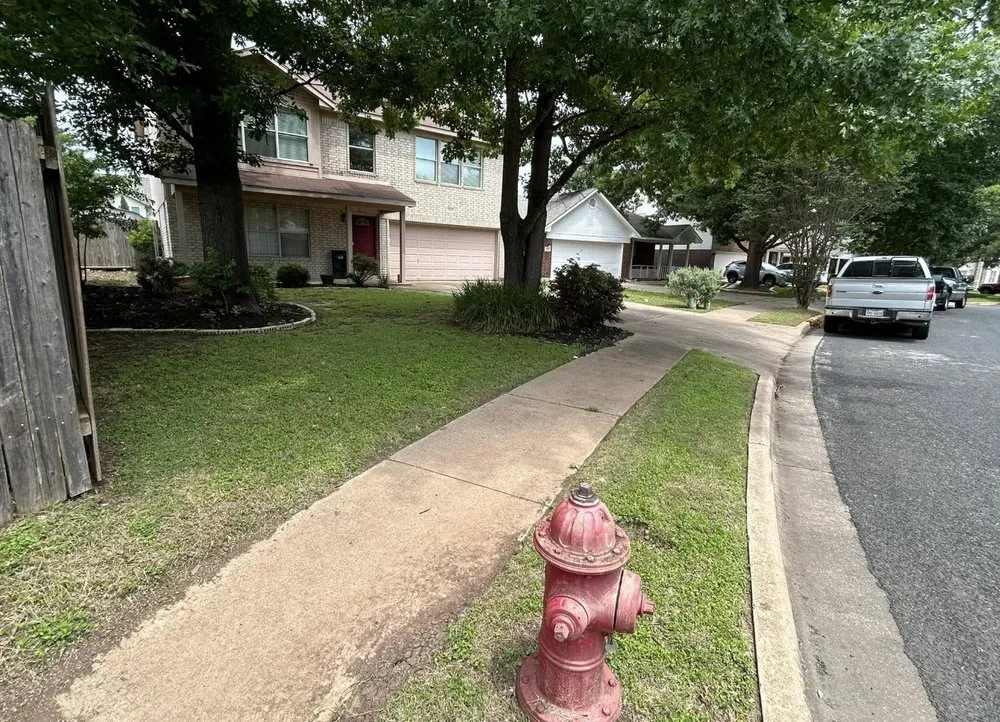 Affordable landscape design for year-round maintenance in Cedar Park, TX by Reidco Service Company