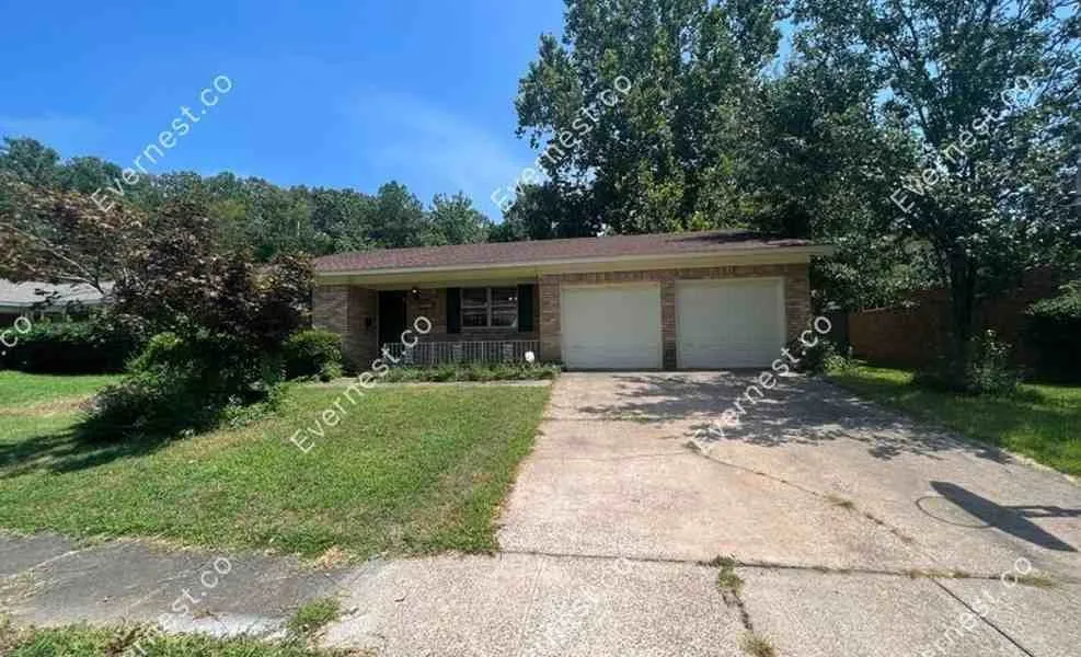 Custom lawn mowing service for outdoor upgrades in Little Rock, AR by Reign Landscaping and Construction Company