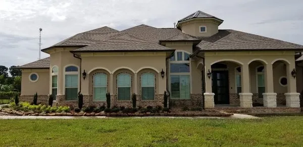 Reli-a-lawn and Landscaping Logo