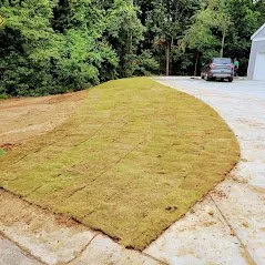 Professional lawn mowing service in Woodstock, GA by Reliable Hardscape Design