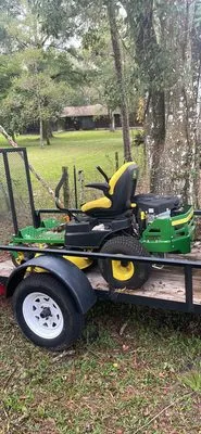 Reliable Lawn Services & Pressure Washing Logo