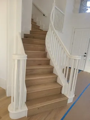 Reliant Construction, Inc Logo