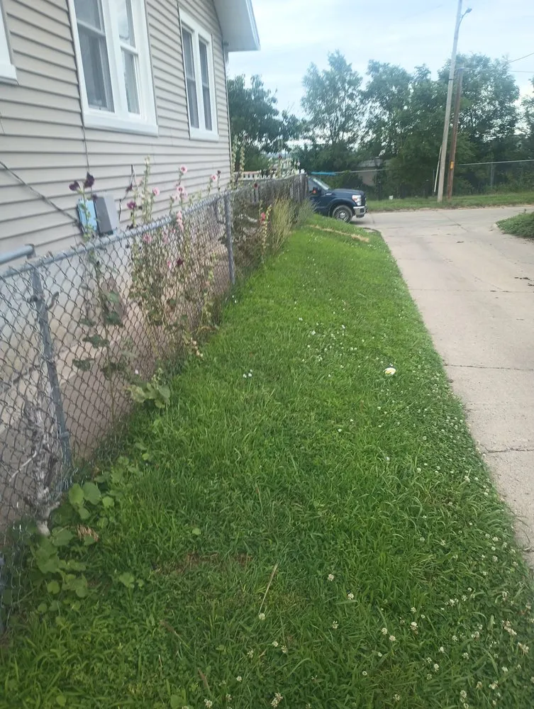 Reliable lawn care service for residential properties in Omaha, NE by Remedios Landscaping and More