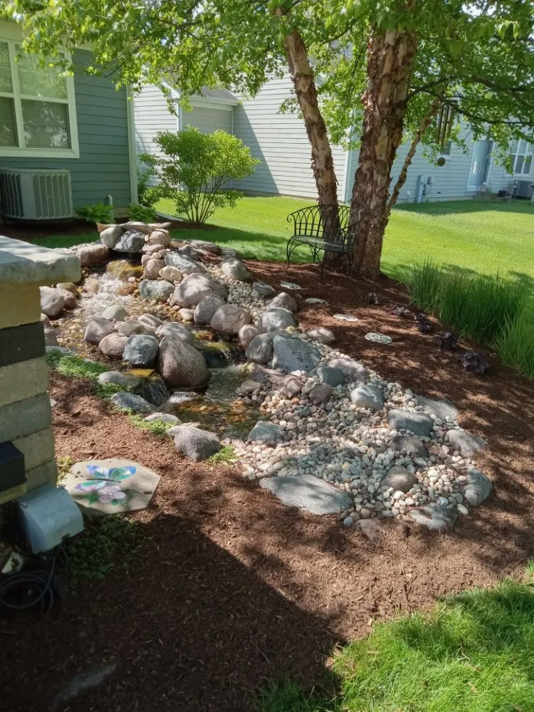 Custom residential landscaping for year-round maintenance in Elgin, IL by Rendon Landscape