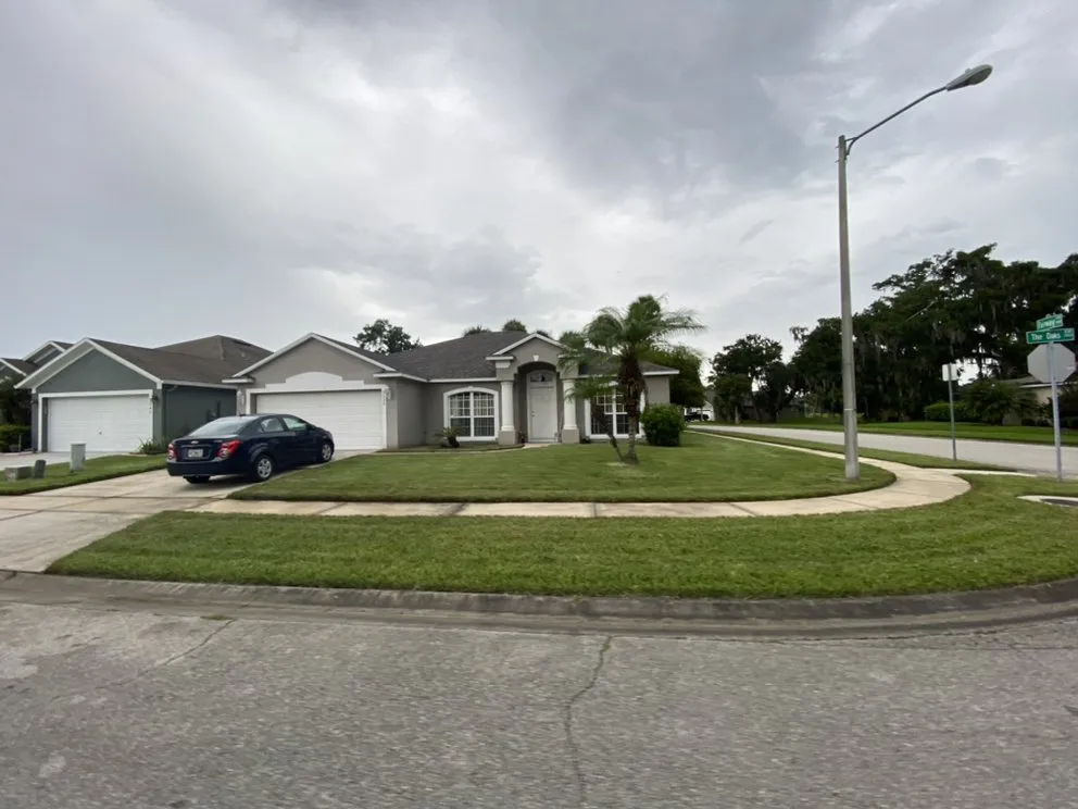 Professional landscape installation for homes in Kissimmee, FL by Reno Home