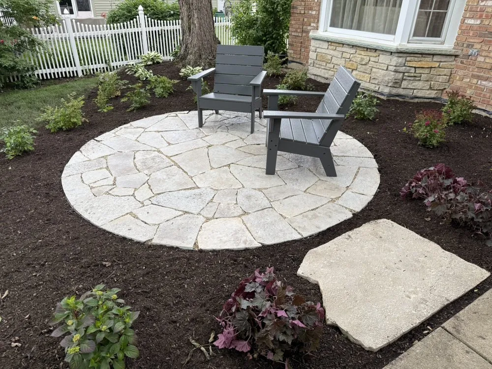 Affordable lawn mowing service for outdoor upgrades in Naperville, IL by Renovatio Landscape & Design