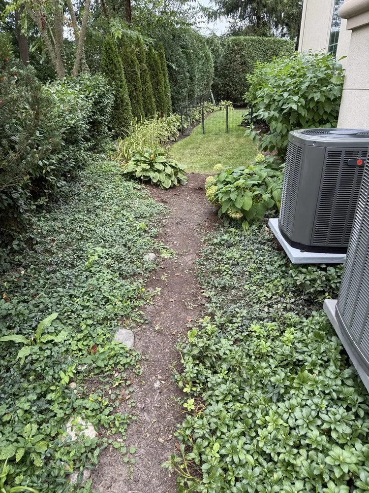 Reliable lawn mowing service with custom design in Naperville, IL by Renovatio Landscape & Design