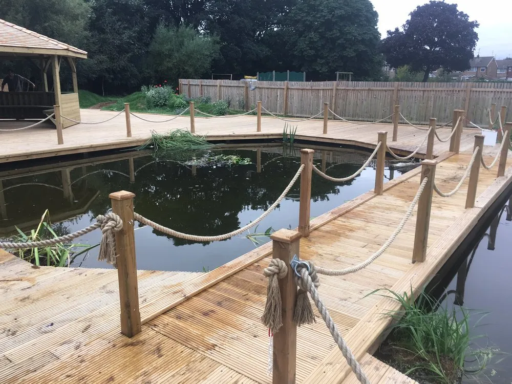 Professional lawn mowing service with custom design in Fairbanks, AK by Rent My English Husband