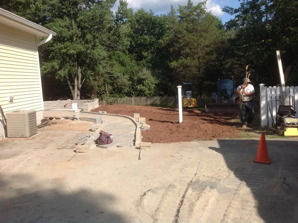 Custom lawn mowing service for residential properties across Bernardsville, NJ - Research & Design Landscape