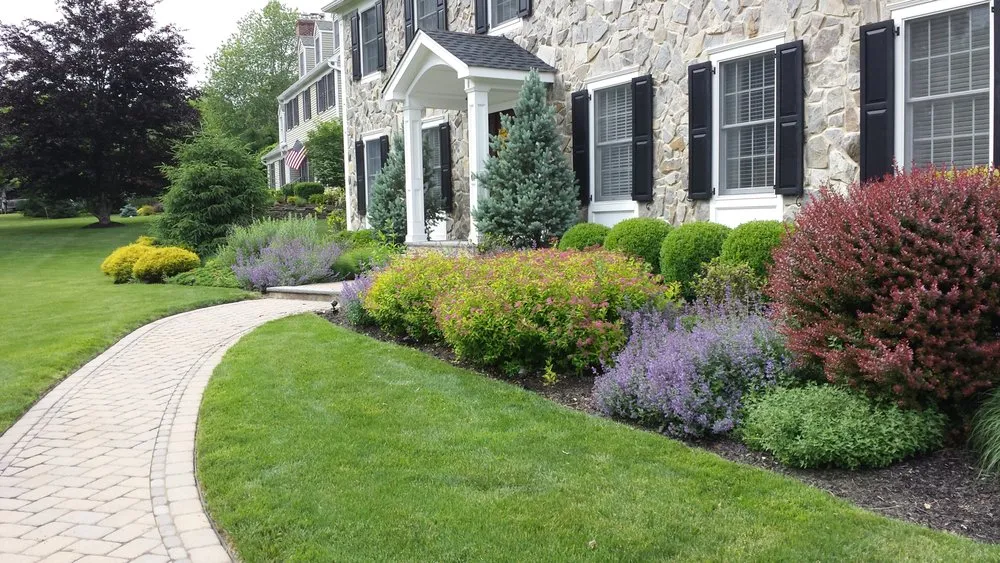 Expert lawn mowing service experts serving Bernardsville, NJ - Research & Design Landscape