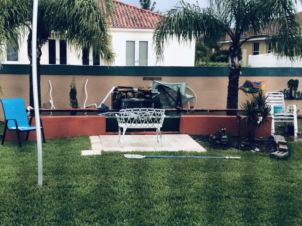 Custom garden landscaping with custom design in Cape Coral, FL by Resto's Lawn Care Services