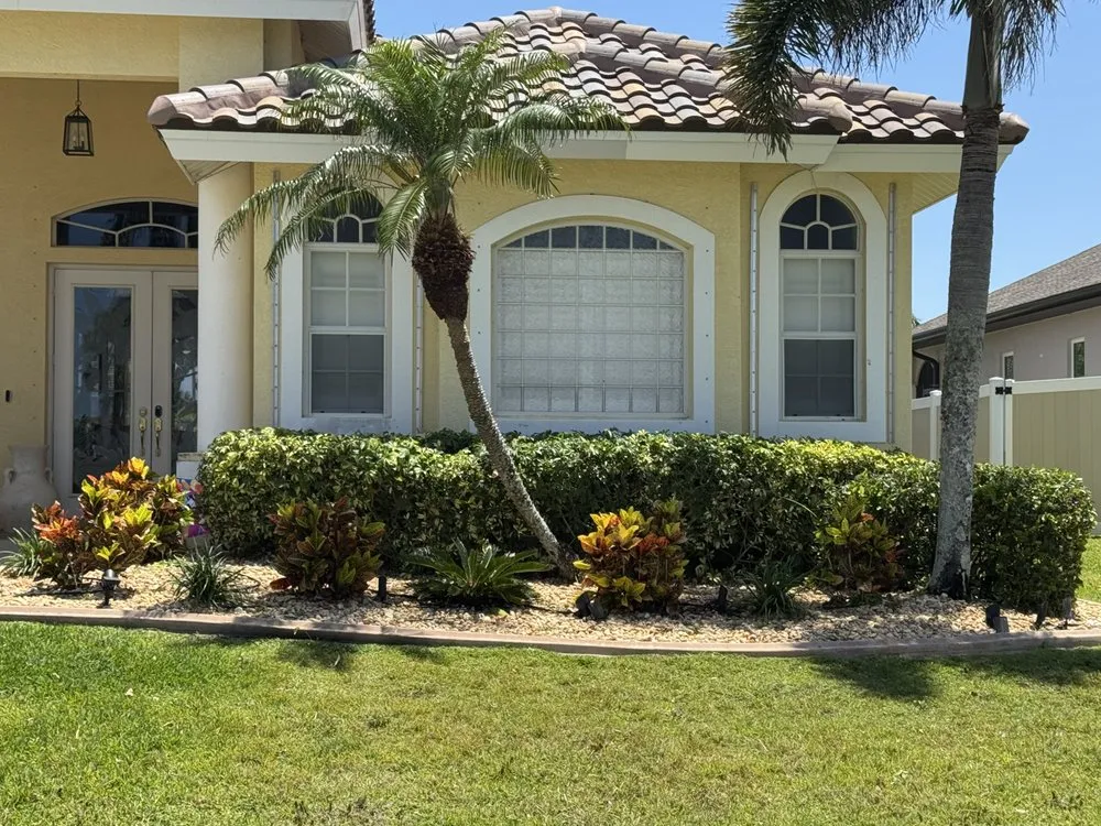 Custom garden landscaping for outdoor upgrades in Cape Coral, FL by Resto's Lawn Care Services