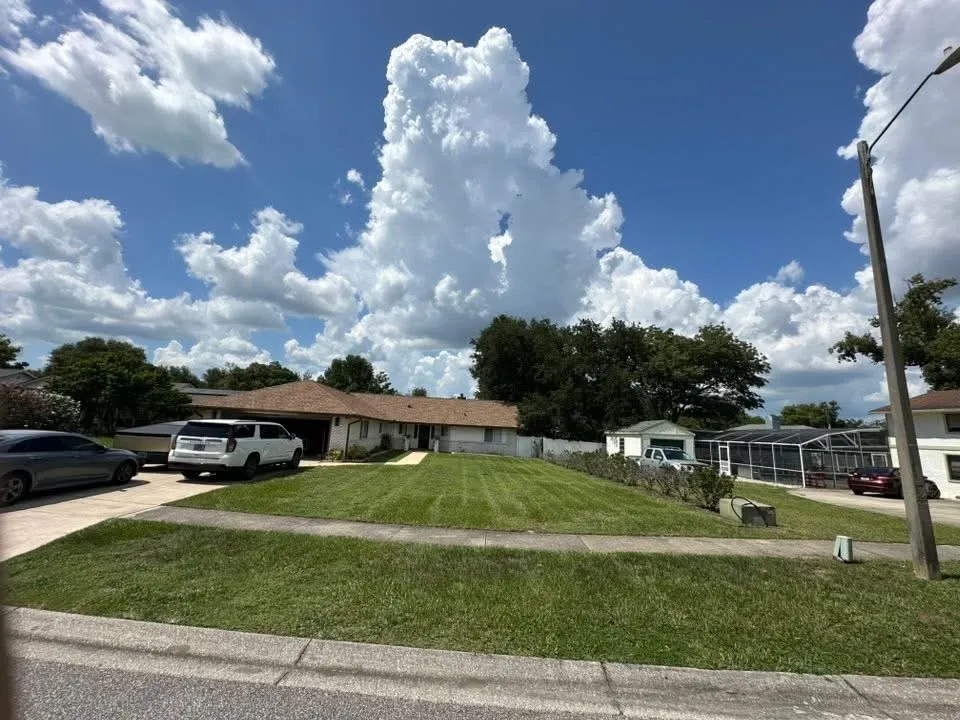 Affordable landscape installation for beautiful yards in Winter Springs, FL by RET lawn service and Landscaping