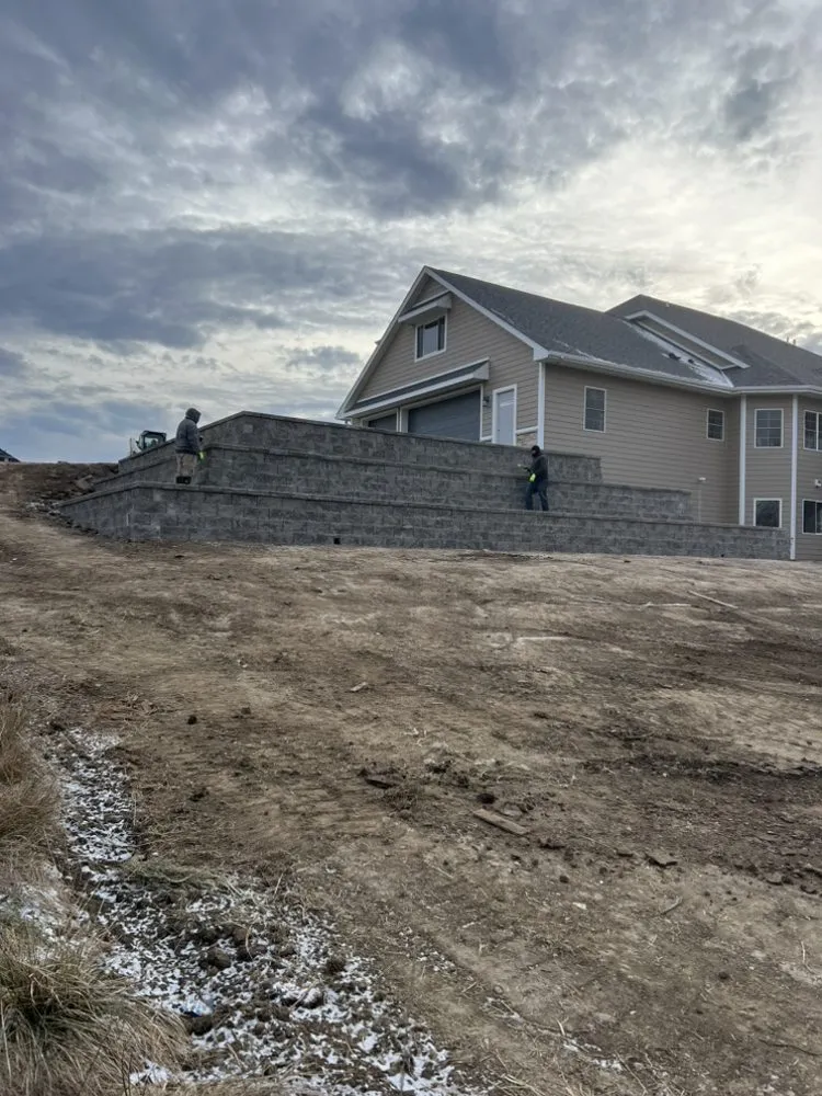 Professional lawn mowing service experts serving Des Moines, IA - Rethink Hardscaping