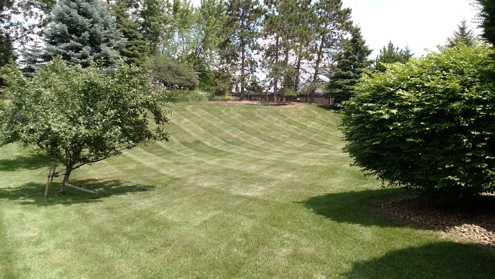 Professional lawn mowing service for year-round maintenance across Burnsville, MN - Rettmann Outdoor Services