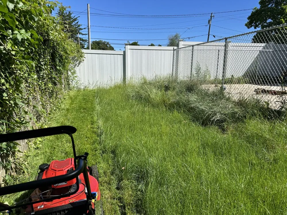 Custom outdoor landscaping in West Islip, NY by Revamp Homes