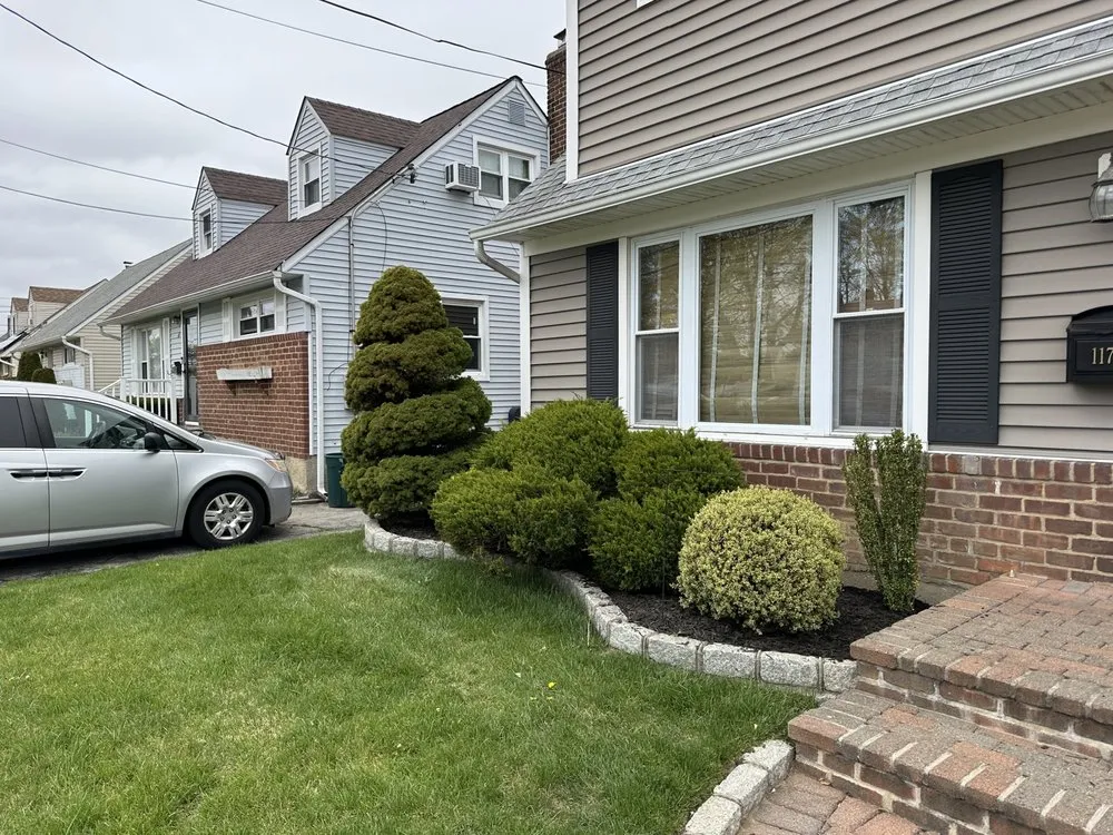 Expert landscape design with custom design in West Islip, NY by Revamp Homes