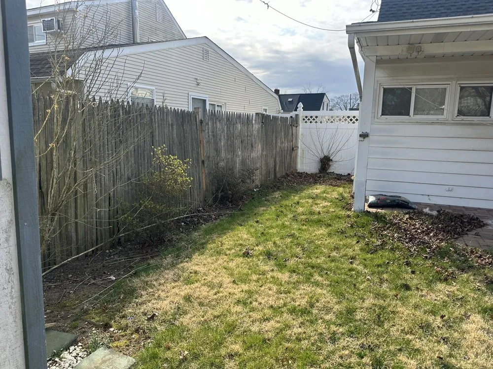 Affordable outdoor landscaping in West Islip, NY by Revamp Homes