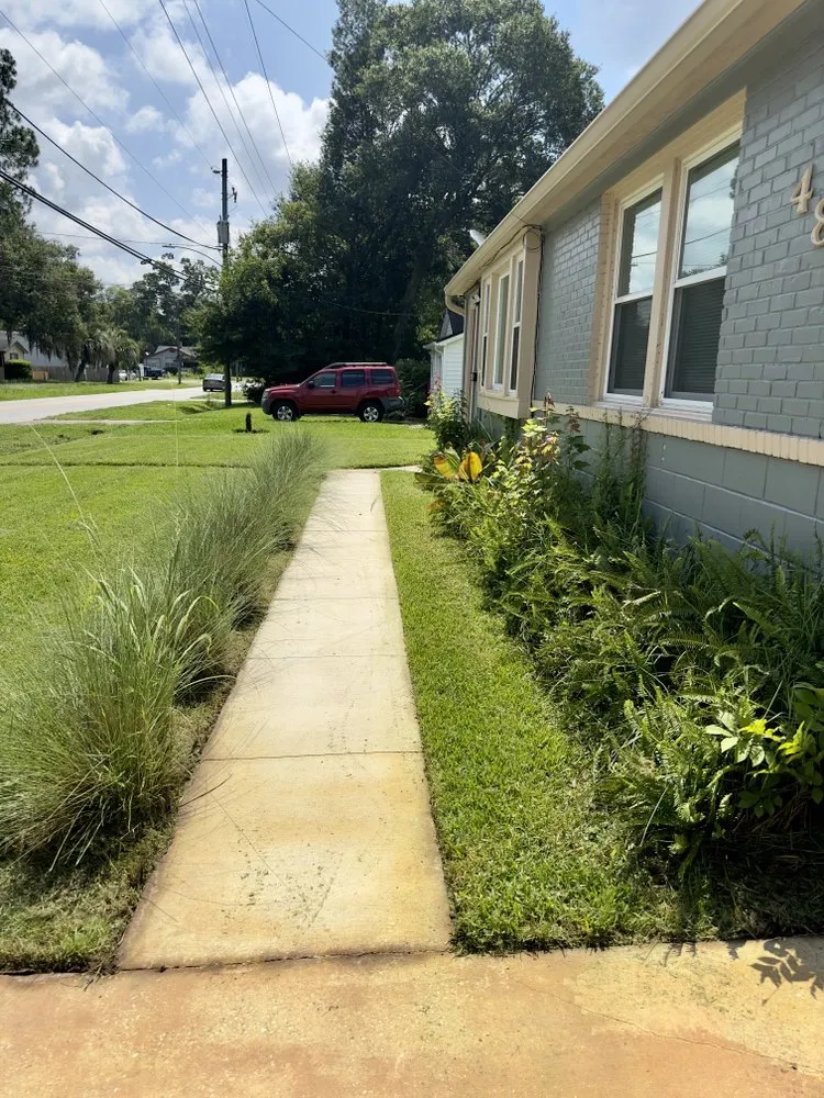 Trusted lawn mowing service with custom design in Middleburg, FL by Revamp It