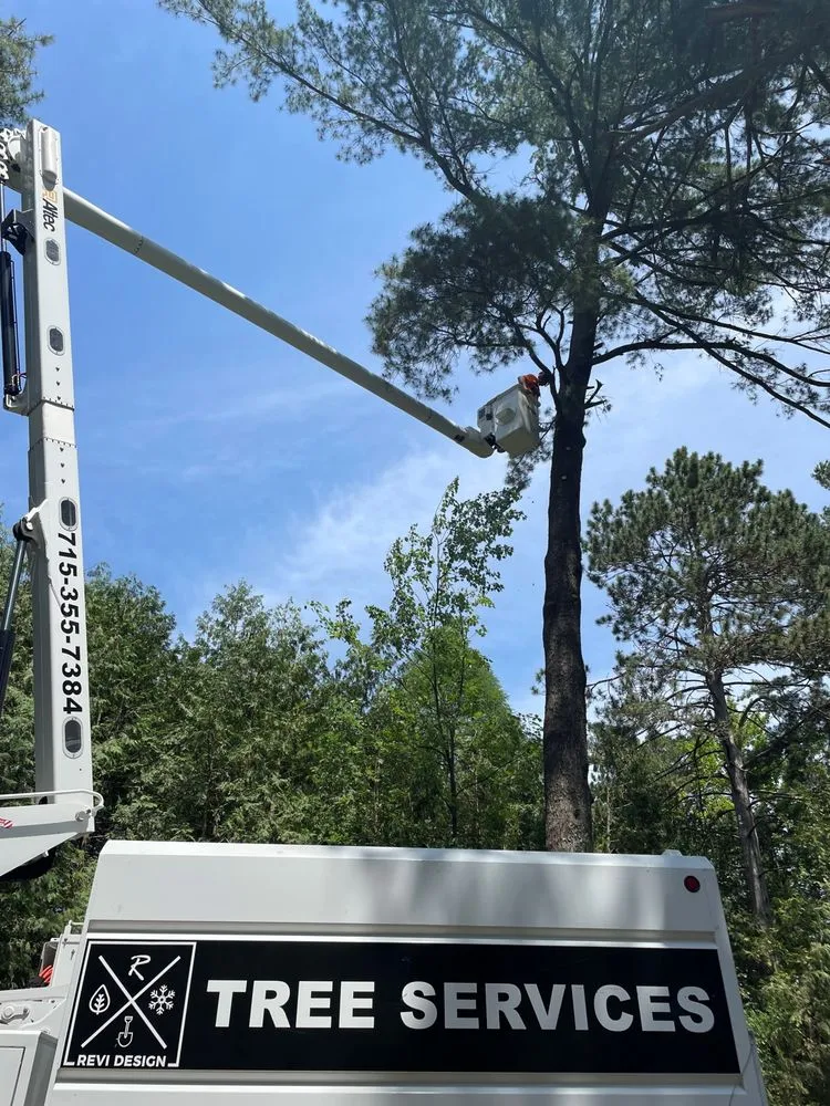 Expert lawn mowing service for year-round maintenance in Wausau, WI by Revi Design