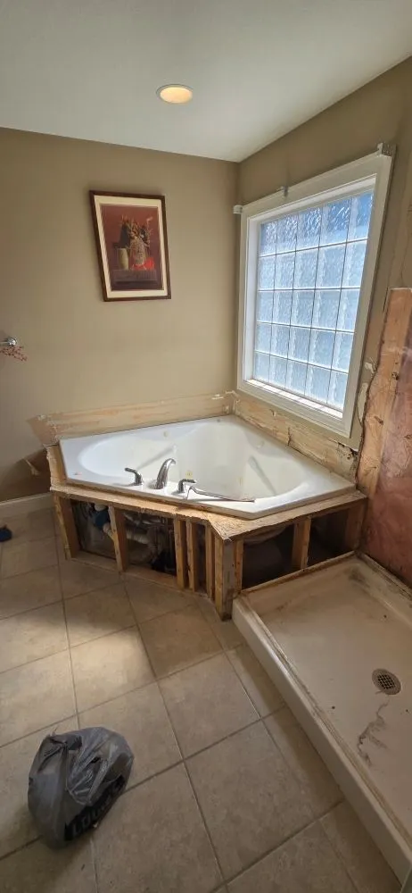 Local lawn mowing service with custom design in Bloomington, IL by Revitalized Construction