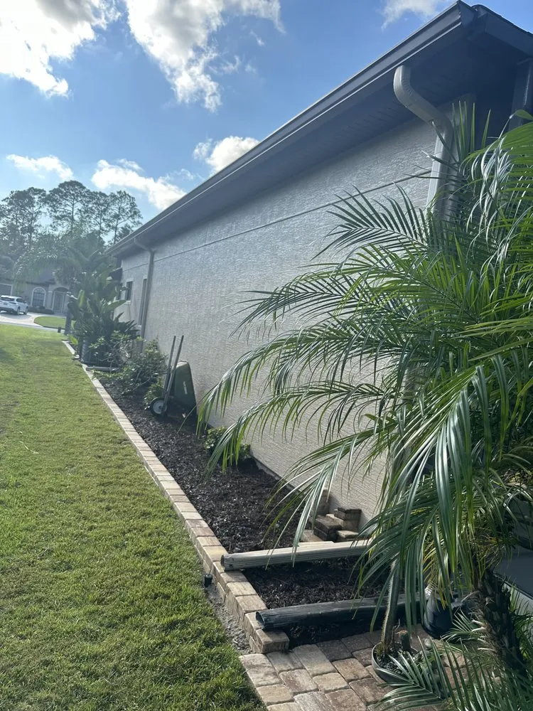 Expert landscape design with custom design in Palm Coast, FL by Revival Lawncare