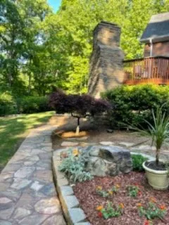 Reliable lawn care service for year-round maintenance in Gainesville, GA by Rex Stonework and Landscape