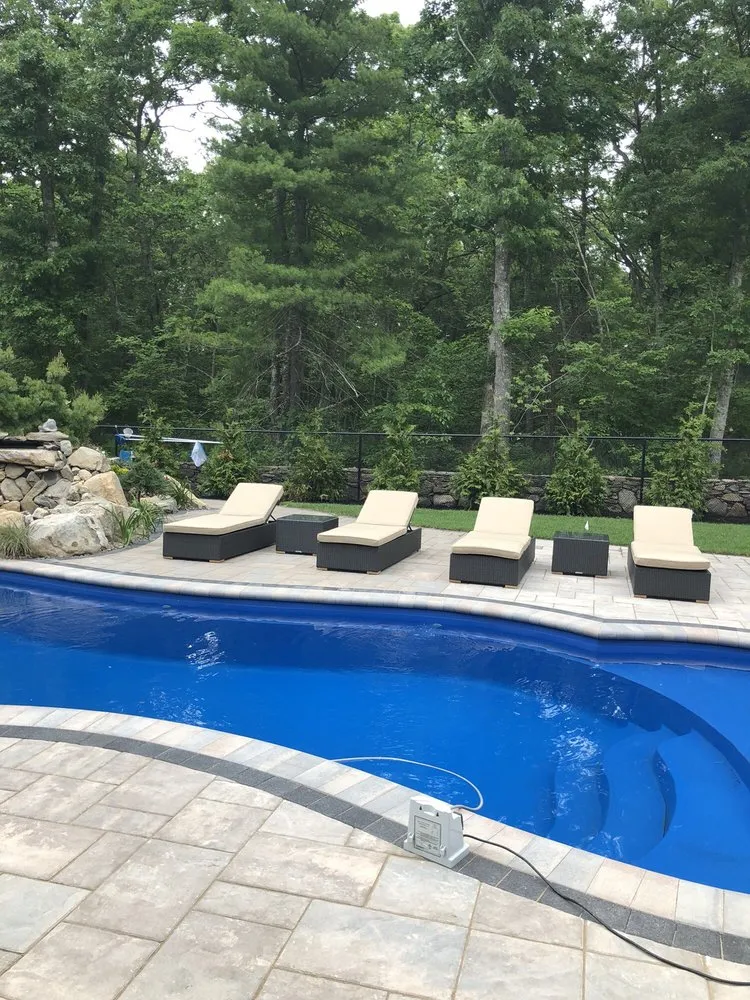 Professional landscape installation in Smithfield, RI by Reyes Landscaping & Masonry