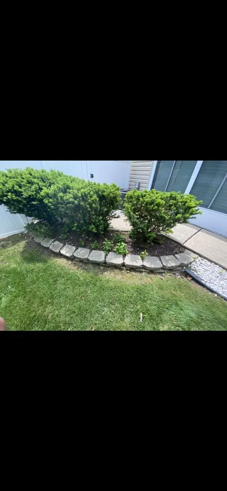 Professional yard cleanup service with custom design in West Chicago, IL by Reyes Landscaping