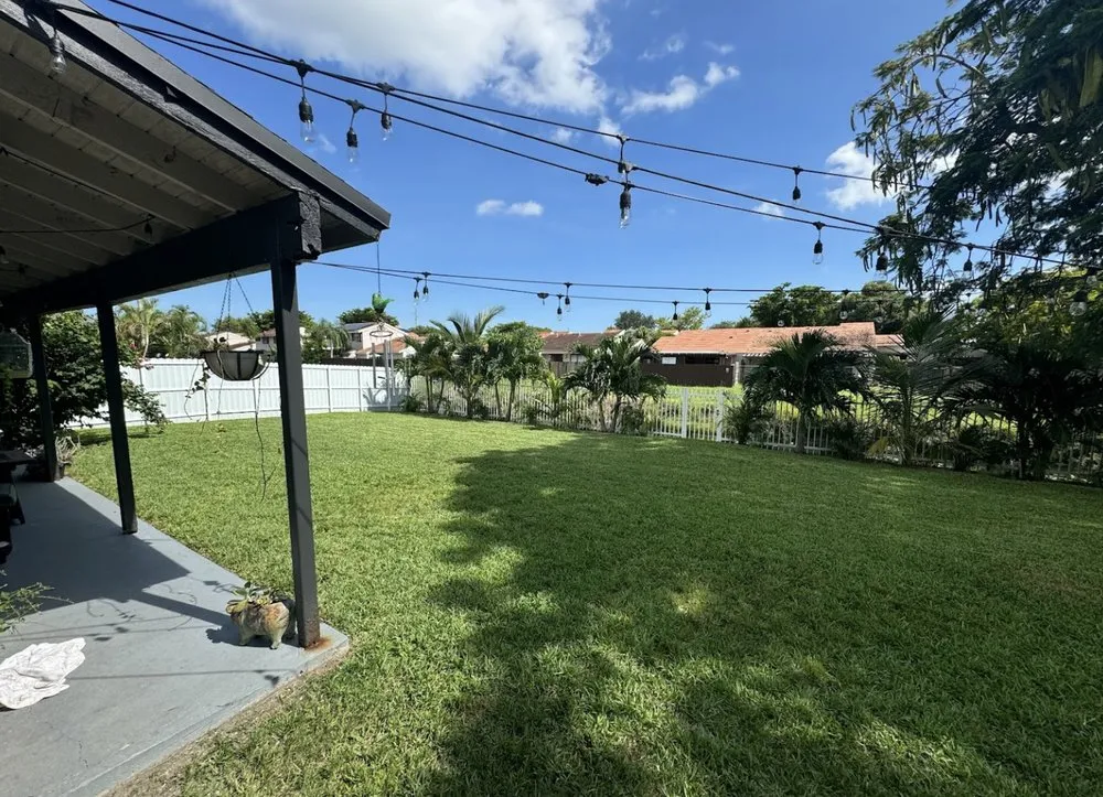 Reliable lawn mowing service for homes in Tampa, FL by REYES The Landscaper