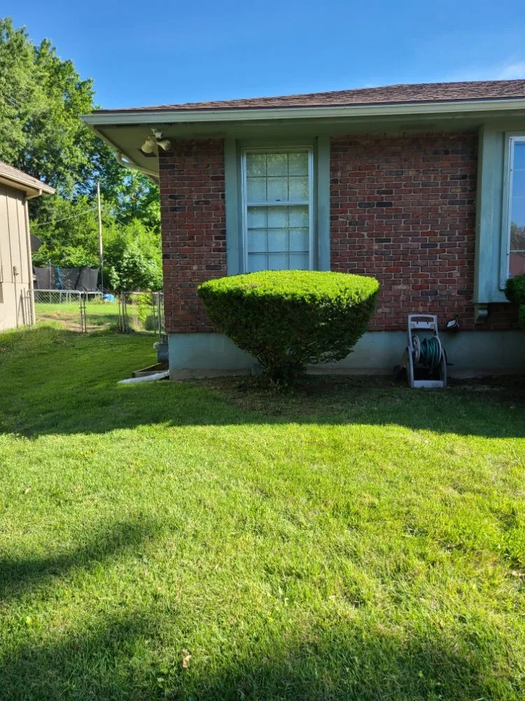 Custom outdoor landscaping for year-round maintenance in Grandview, MO by Reynolds Lawn Care