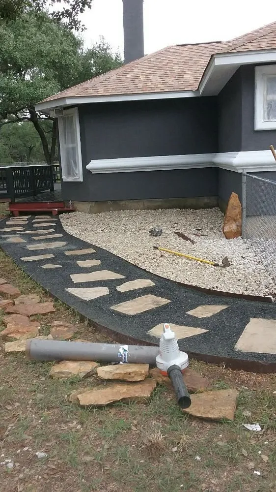 Custom landscape installation in Devine, TX - Rey's Lawn & Landscaping