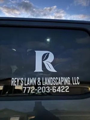 Rey’s Lawn & Landscaping Logo