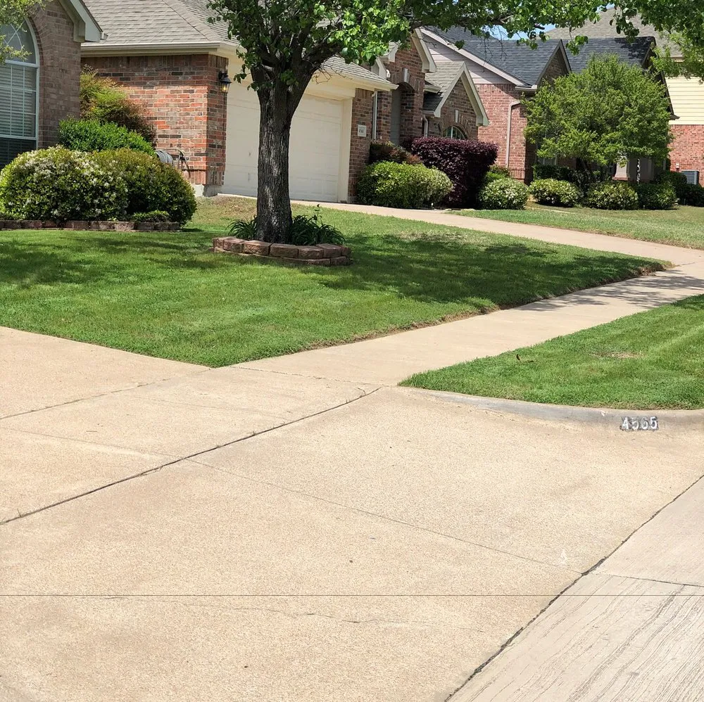 Custom garden landscaping for outdoor upgrades in Duncanville, TX by Rey's Lawncare