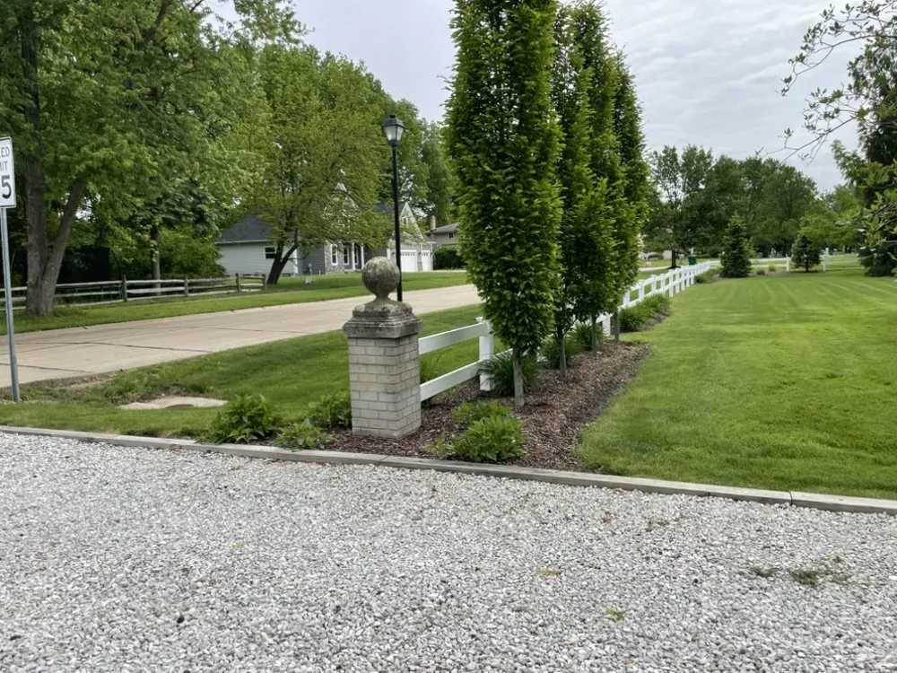Custom yard cleanup service for year-round maintenance in Painesville, OH by R&G Lawn Care