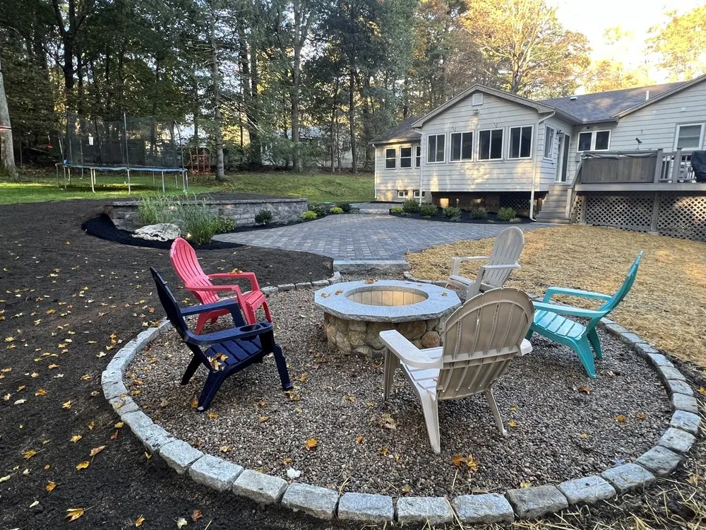 Custom lawn mowing service for residential properties across Rowley, MA - RG Masonry