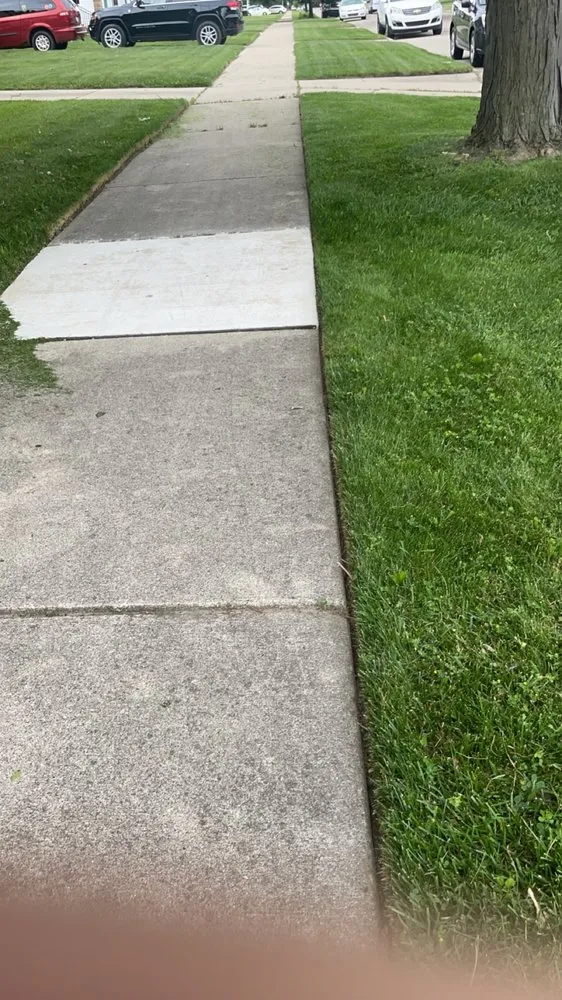 Local lawn care service for year-round maintenance in Belleville, MI by Rhodesgreencare