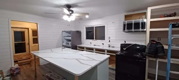 Ria Construction Logo