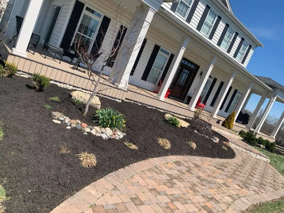 Custom yard cleanup service for homes in Shelbyville, KY by Richards Family Lawn Care