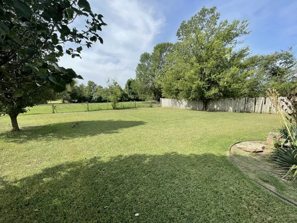 Expert yard cleanup service in Owasso, OK by Richardson's Family Lawn Service