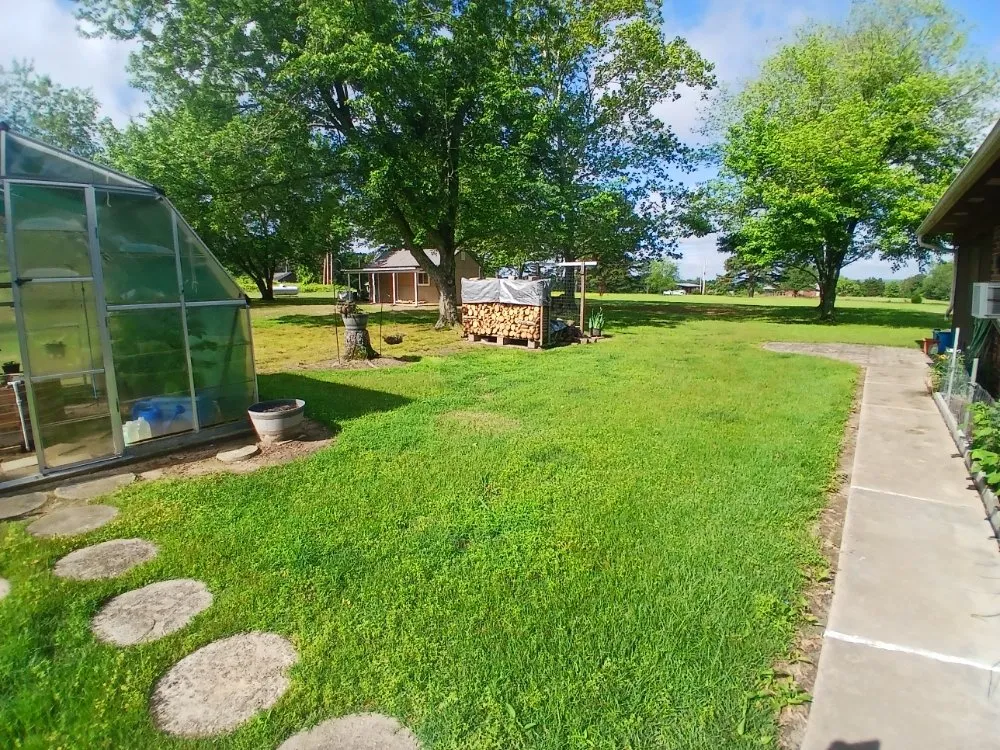 Affordable lawn mowing service for beautiful yards across Dyer, AR - Richeys Landscaping & Small Engine Repair