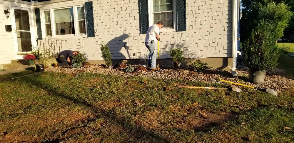 Trusted lawn mowing service for residential properties in Manchester, CT by Richman Family Landscape