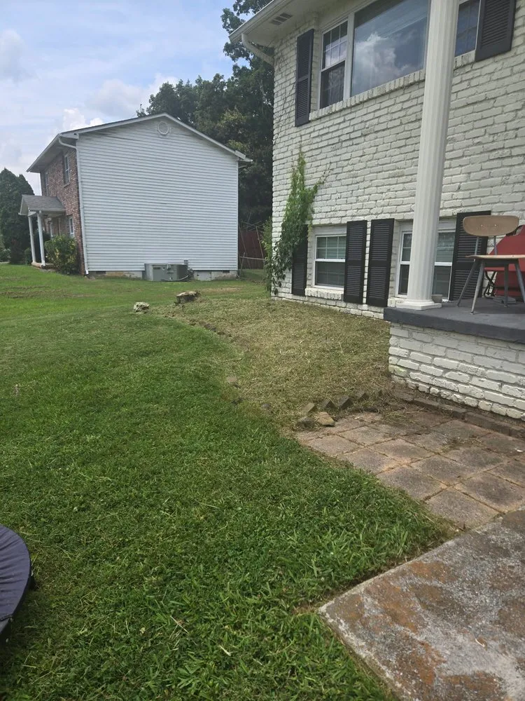 Reliable yard cleanup service for homes in Knoxville, TN by Rick Fowler’s Lawn Mowing Services