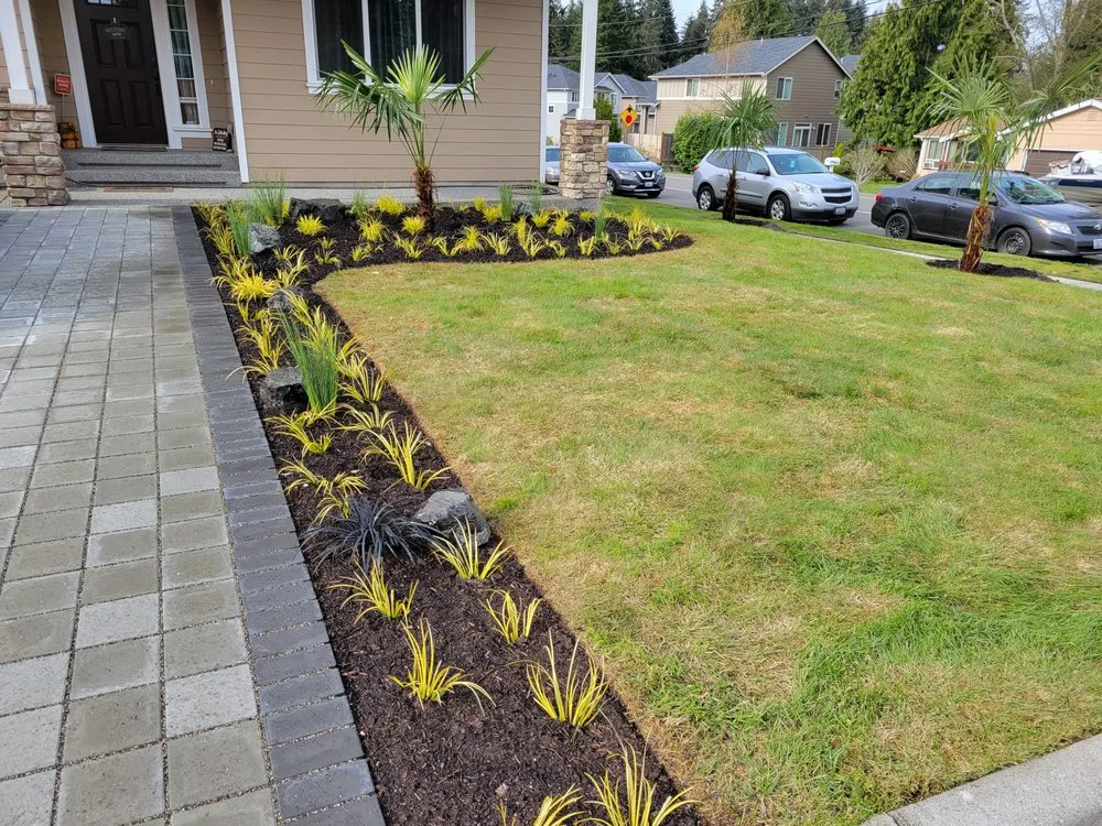 Reliable lawn mowing service for beautiful yards in Lynnwood, WA by Rick's Landscaping & Construction
